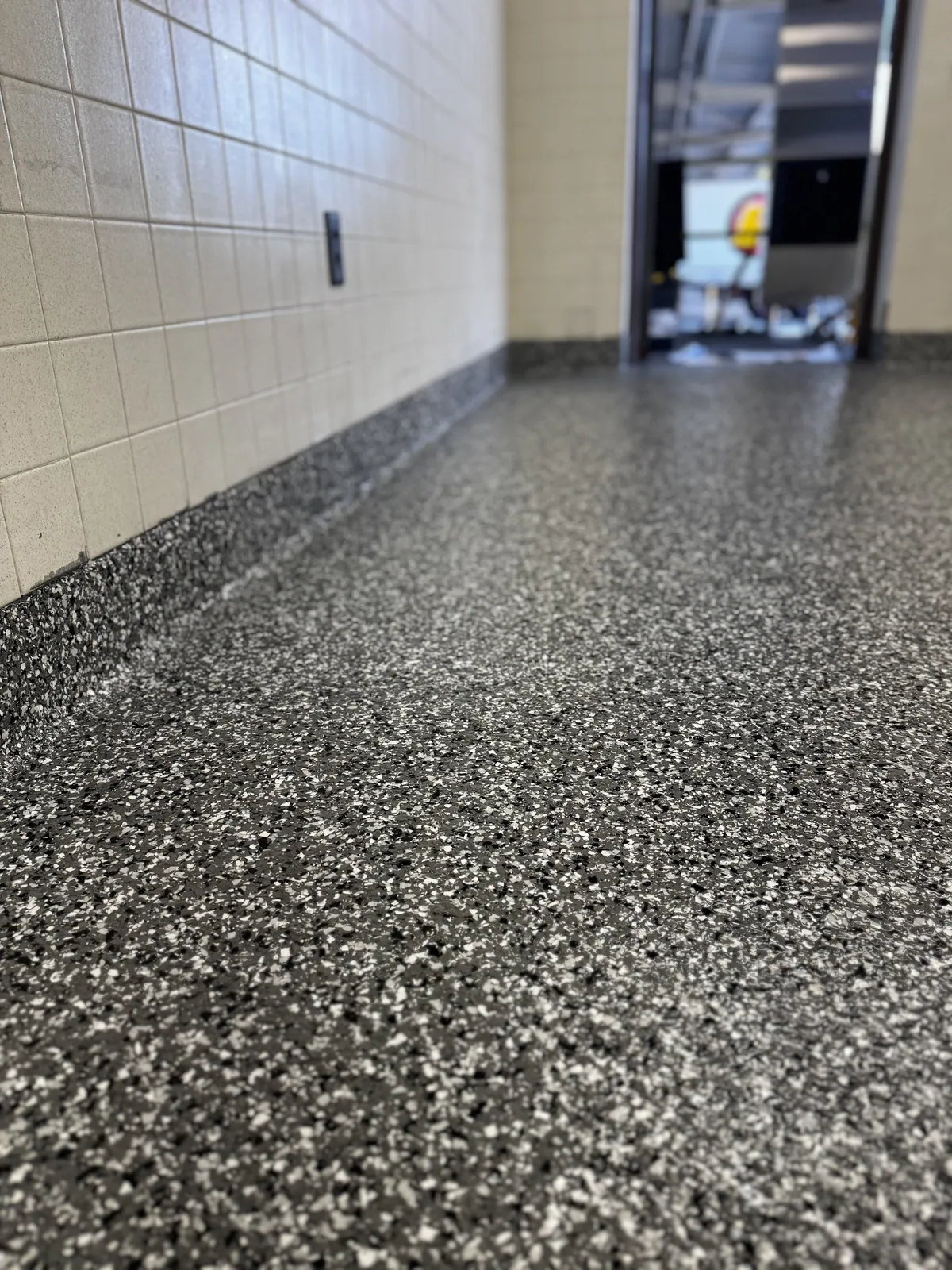 Flake Floor floor installed by Empire Flooring