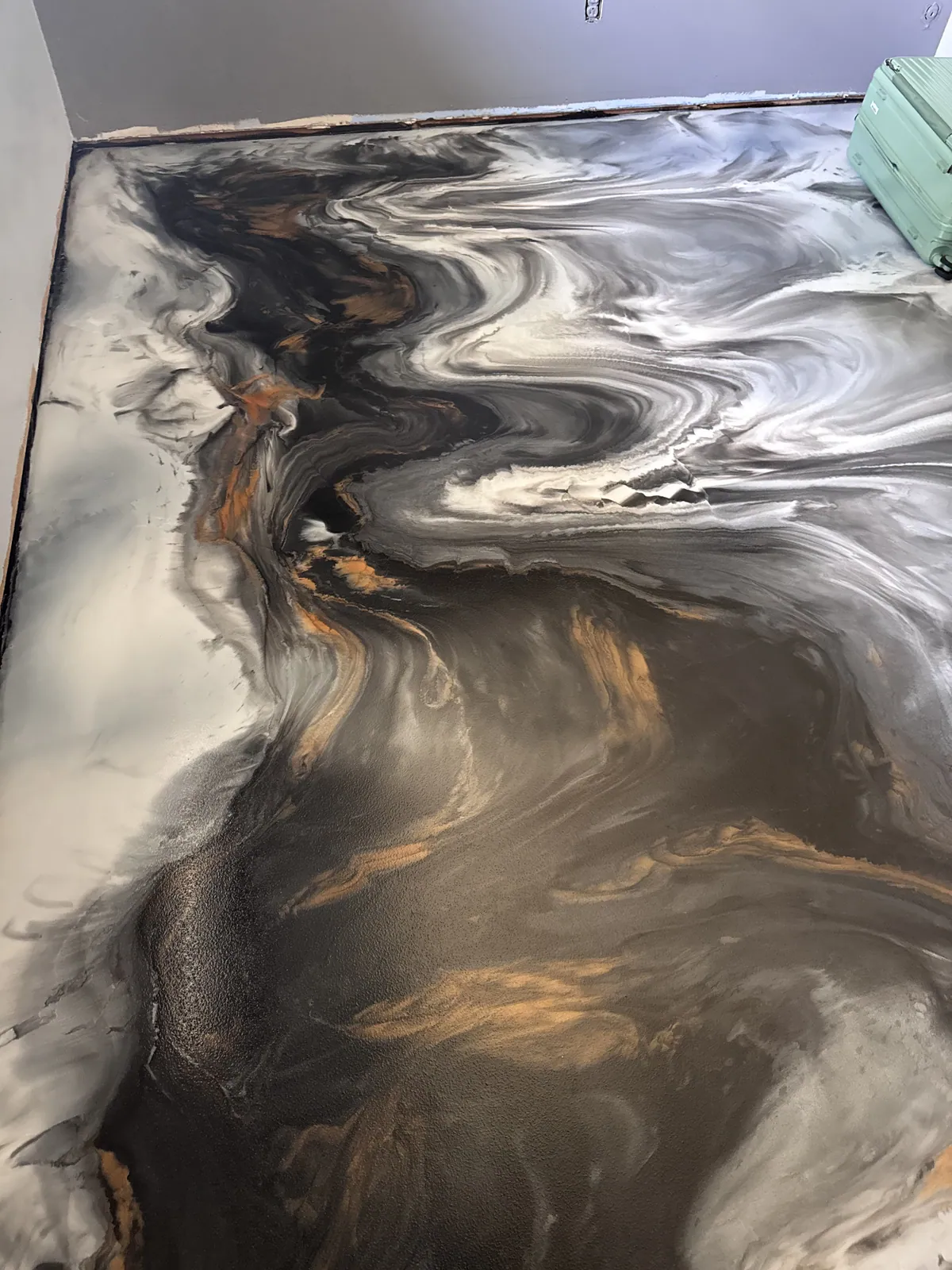Metallic Epoxy floor installed by Empire Flooring